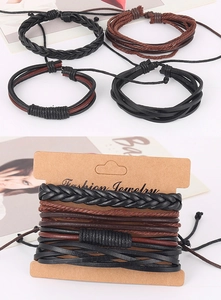 Detail view of four-piece vintage braided leather bracelets with alloy leaf charms on a card