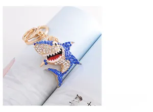 Detailed view of shark keychain featuring colorful rhinestones and gold alloy hardware