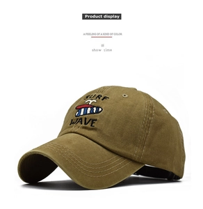 Close-up of Surf Wave embroidery and washed cotton texture on khaki baseball cap