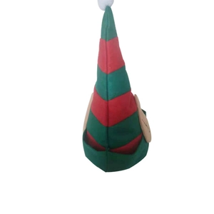Detail of red and green striped Christmas elf hat with pointed top and side ears