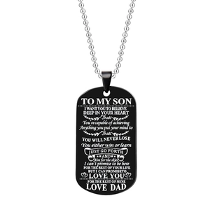 Detail of black titanium dog tag with 'To My Son' engraving on silver bead chain