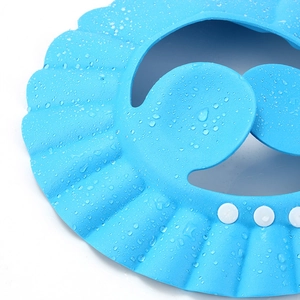 Blue adjustable baby shower cap with ear protection and waterproof droplets surface
