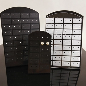 Black and white 72-hole earring display stands in various sizes for jewelry storage