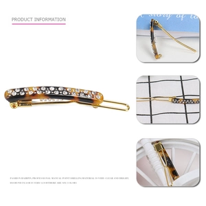 Elegant leopard print resin hairpin with sparkling rhinestones and golden metal clip