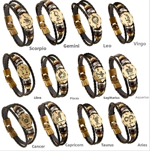 Detailed display of 12 constellation leather bracelets with metal zodiac sign charms