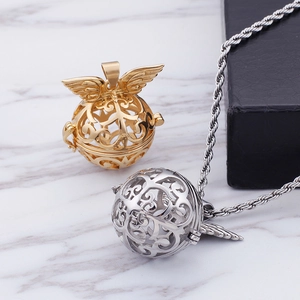 Angel wing hollow spherical perfume locket pendant in gold and silver finish