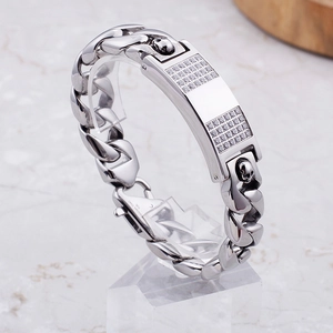 Men's silver 316L stainless steel Cuban chain bracelet with iced-out skull plate