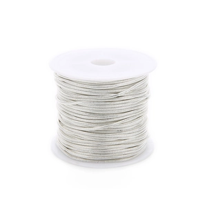Detailed close-up of a 10-yard silver-plated snake chain roll on a white spool for jewelry