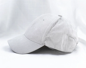 Detail of light gray faux suede baseball cap showing fabric texture and six-panel stitching
