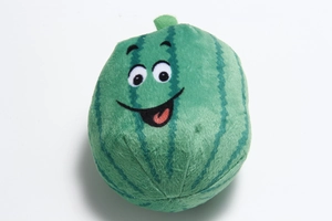 Detailed view of watermelon plush dog toy with soft green texture and cartoon face