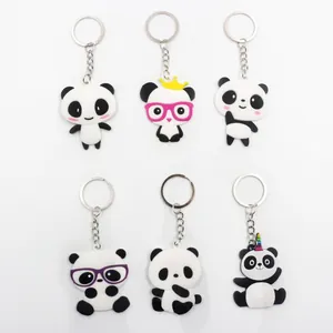 Detailed set of six cute cartoon panda PVC keychains with colorful accessory elements