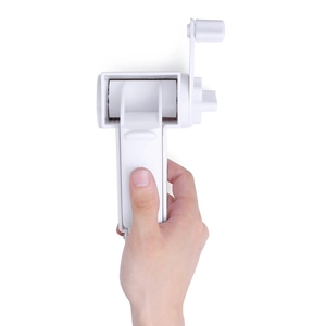 Close-up of handheld manual stainless steel rotary cheese grater with crank handle