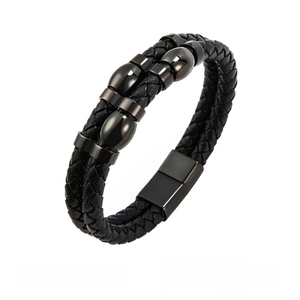 Macro detail of men's multi-layer black leather woven bracelet with magnetic metal clasp