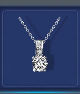 Detailed macro view of silver necklace with a large round cubic zirconia in four-prong setting