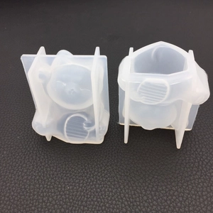 Detailed view of translucent silicone lucky cat molds with external support frames