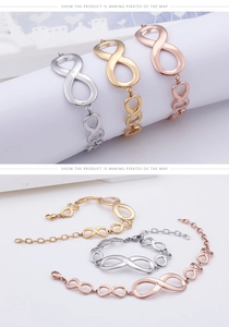 Detail of infinity symbol bracelets in gold, silver and rose gold with lobster clasps
