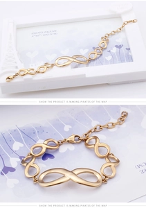 Detailed view of the gold infinity symbol bracelet with adjustable link chain and clasp