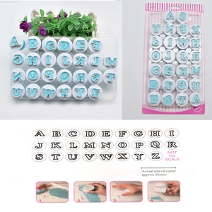 Detailed view of 26-piece alphabet cookie cutter set with size guide and usage steps