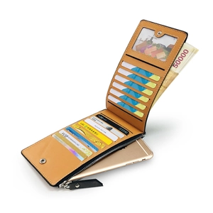 Detailed interior of vintage long wallet showing card slots and zipper compartment