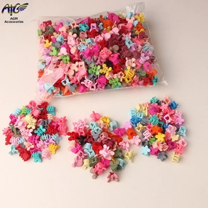 Bulk set of colorful mini plastic claw clips in assorted heart and star shapes