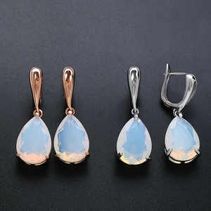 Elegant rose gold and silver lever-back drop earrings with pear-cut opal stones