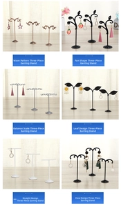 Three-piece set metal earring display stands in various designs and heights