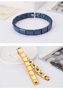 Detail view of titanium steel magnetic bracelets showing blue and gold variants and magnets
