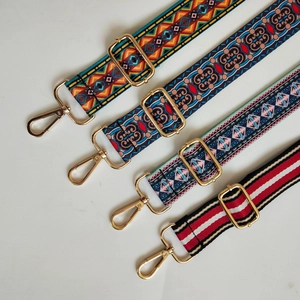 Adjustable wide replacement bag straps in ethnic and geometric patterns with gold hooks