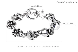 Macro shot of vintage silver stainless steel skull link bracelet with OT toggle clasp