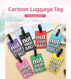 Detail of colorful PVC luggage tags with not YOUR BAG text and adjustable straps
