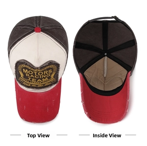 Detail view of distressed racing team baseball cap showing inner lining and embroidery