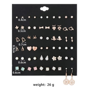 Set of 24 pairs mixed stud earrings with heart, flower, bow and owl motifs