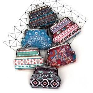 Collection of vintage ethnic print kiss-lock coin purses with various creative patterns