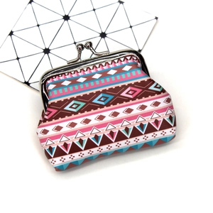 Detail of vintage ethnic geometric print coin purse with silver metal ball clasp closure