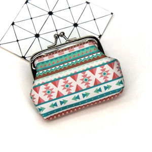 Detailed close-up of Bohemian canvas coin purse with vintage silver metal clasp closure