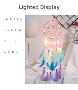 Close-up of LED dream catcher with gradient feathers and glowing decorative lights