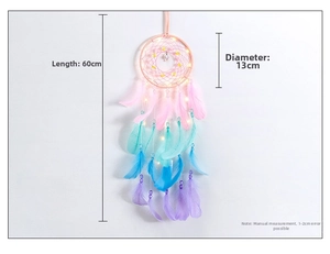 Detail of pink hot air balloon dreamcatcher with LED lights and colorful feathers