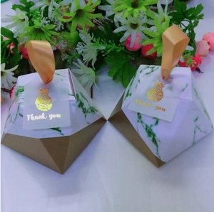 European marble pattern pyramid wedding favor box with champagne ribbon and gold base