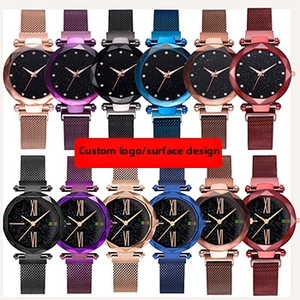 Detail of starry sky dial and faceted glass crystal on ladies' magnetic mesh strap watches