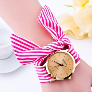 Geneva quartz watch for women with pink striped fabric strap tied in a bow