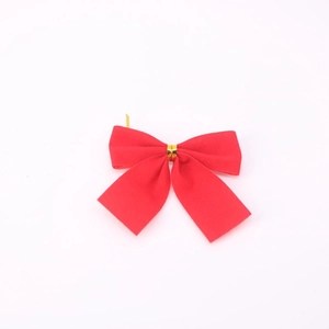 Close-up of red ribbon Christmas bows with gold twist ties for tree decoration