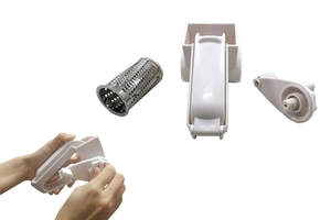 Detailed assembly view of a white manual rotary cheese grater with stainless steel drum