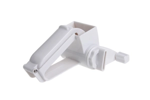 Close-up of white plastic rotary cheese grater with manual handle and stainless steel drum