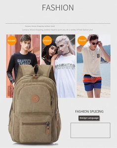 Detail view of khaki canvas backpack with multiple zippers and multi-pocket layout