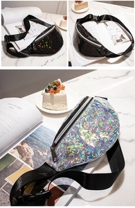 Macro detail of laser sequin waist bag material with zipper and adjustable strap