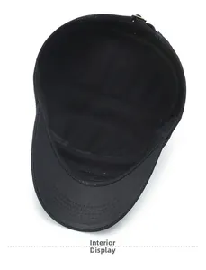 Detailed interior of a black flat top military cap showing lining and metal buckle