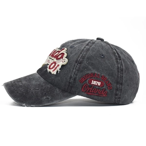 Vintage washed black denim baseball cap with Orlando 1876 embroidery and distressed details