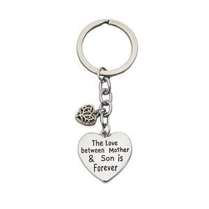 Silver mother and son heart keychain with engraved forever love message on white background