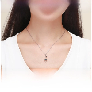 Exquisite S925 silver butterfly pendant necklace shown on model for elegant fit