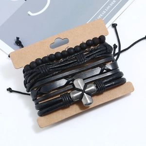 Lot de bracelets en cuir tressé vintage avec pendentif croix sur carte brune